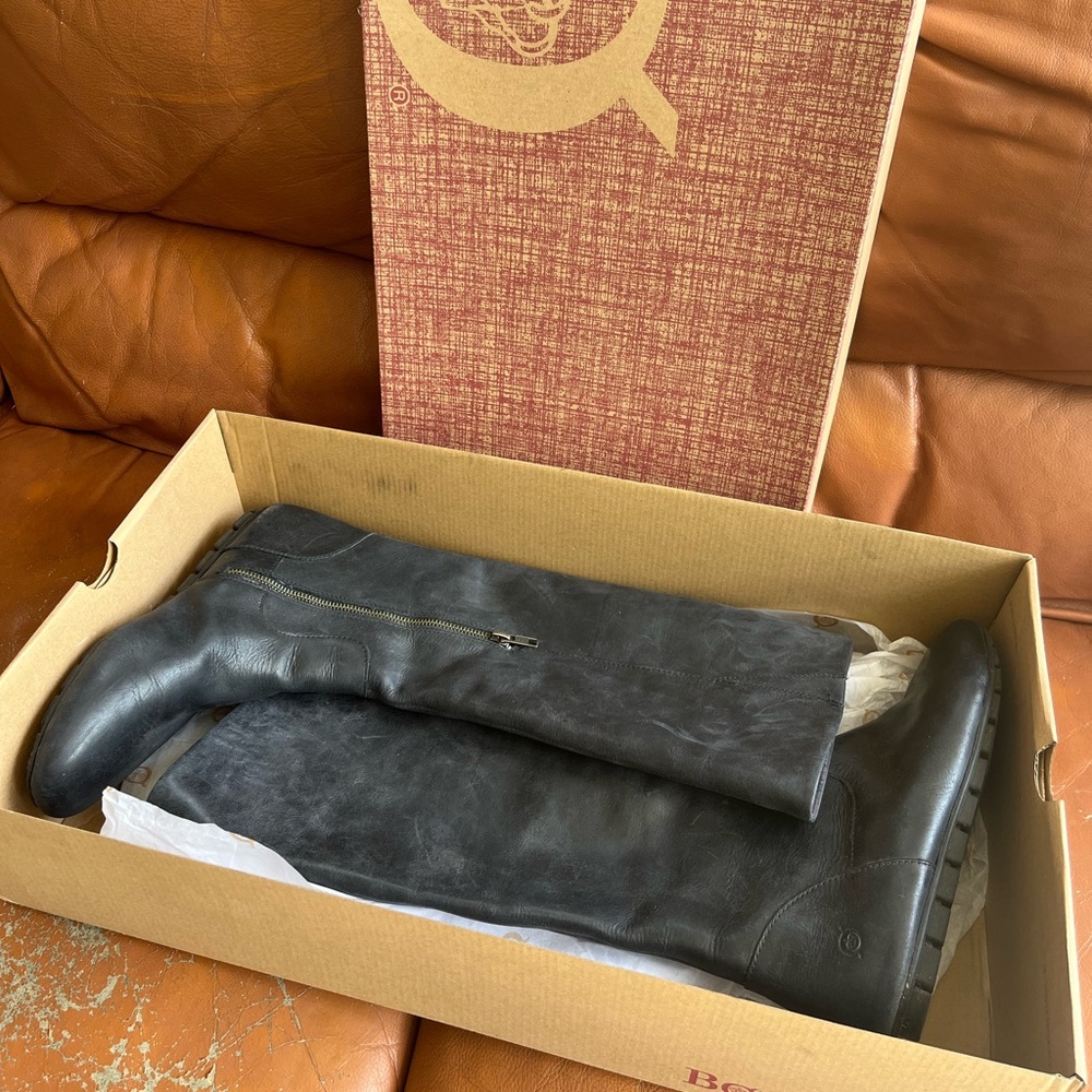 Tall black leather boots